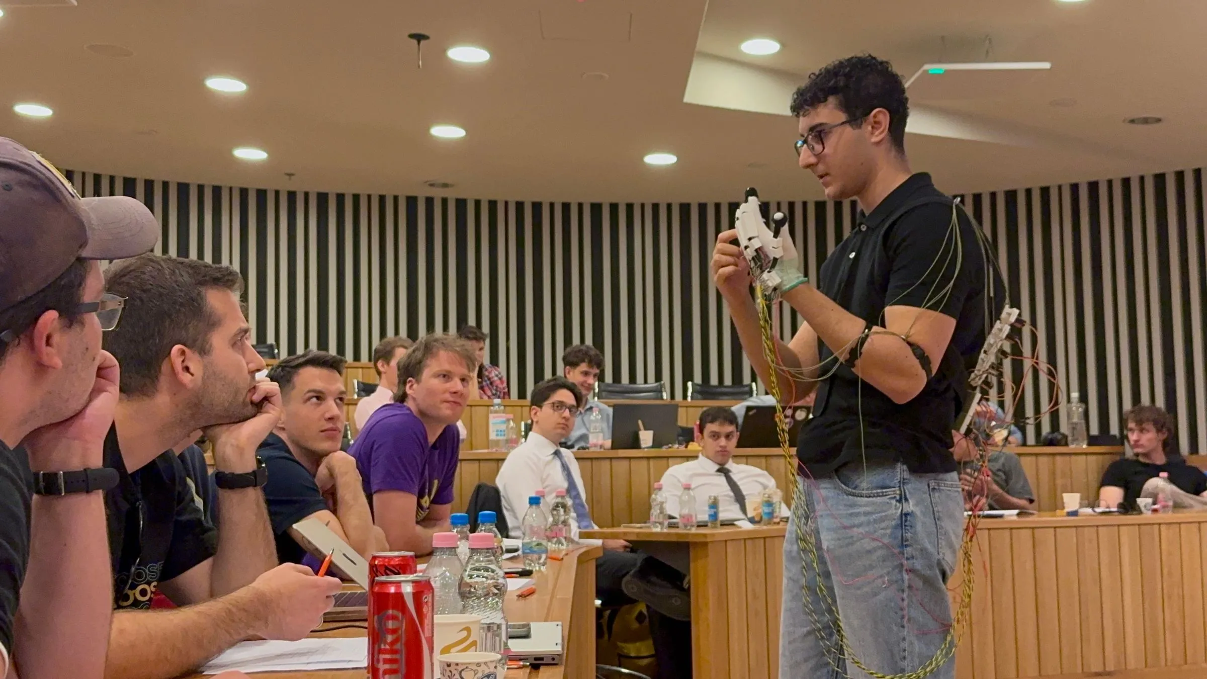 Demoing the exosuit during the talk